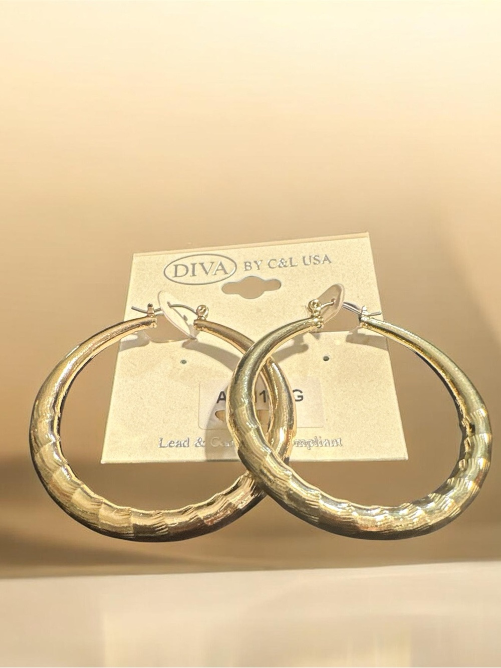 Diva Shimmering Gold Hammered Hoop Earrings
373